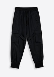 Close-up of premium wool high-waist joggers on plain background, East Vibe